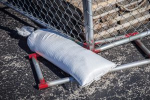 sandbag on temp fence